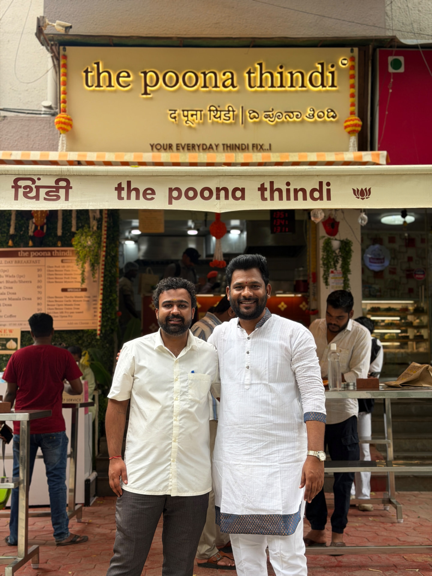 Satyam Sharma and Samadhan Pawar outside The Poona Thindi